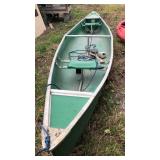 17 foot green Coleman canoe with oars