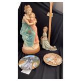 Two heartwarming statues, two collector plates