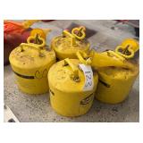 Four Yellow 5-Gallon Eagle Gas Cans