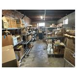 Contents of New Stock Room includes New Steel Toe Rubber Boots, New Gloves, New Food Trays, New Floor Mats, New Protective Face Sheilds, New Carts, and all Shelving