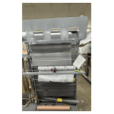 Screen Roll Storage Rack with Assorted Window & Door Screening Material Rolls Included