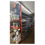 Freestanding Gondola Display Shelving: 3 Double-Sided Sections, Gray Pegboard with Red End Cap, Peg Hooks, and Shelves