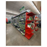 Freestanding Gondola Display Shelving: 7 Double-Sided Sections, Gray Pegboard with Red End Cap, Peg Hooks, and Shelves