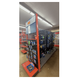 Freestanding Gondola Display Shelving: 3 Double-Sided Sections, Black Pegboard, Red End Cap with Wire Grid Top