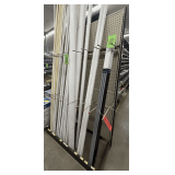 Retail Display Shelving: 1 Section, Tan Pegboard, with Pipe and Rod Peg Arms