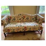 Floral Upholstered Camelback Settee with Carved Wo