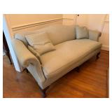 Upholstered Sofa With Carved Wooden Legs
