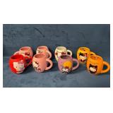 Eight Hello Kitty Themed Ceramic Mugs
