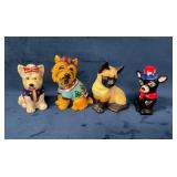 Four Small Animal Figurines in Various Attire