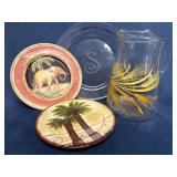 Three Plates and a Decorative Glass Pitcher with Y