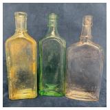 Three Antique Apothecary Bottles Featuring Company