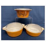 Three Pyrex Baking Dishes in Amber Color with Lids