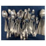Mostly Spoons in Various Sizes with Forks Included