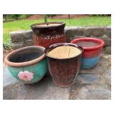 Four Ceramic Garden Pots in Various Colors and Pat