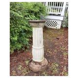 Cast Iron Sundial with Inscribed Face on Concrete