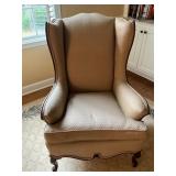 Upholstered Wingback Armchair with Carved Wooden L