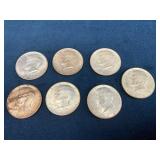 Seven 1968 Kennedy Half Dollars