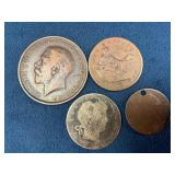 Four Assorted Coins Including British and US Penny