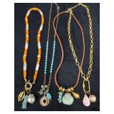Four Mixed-Material Necklaces with Gold-Tone Accen