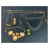 Five Gold-Tone Jewelry Pieces Including Necklaces