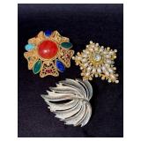 Three Vintage Brooches: Filigree, Rhinestone, and
