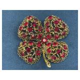 Gold-Tone Four-Leaf Clover Brooch with Red Rhinest