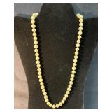 Strand of Cream-Colored Glass Faux Pearls with Orn