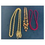 Costume Jewelry Necklaces in Gold, Pearl, and Red