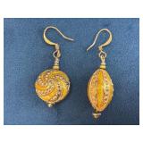 Gold-Toned Drop Earrings with Intricate Swirl and