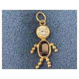 Gold Tone Unmarked Figure-Shaped Pendant with Clea