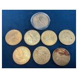 Eight U.S. One Dollar Coins Featuring Various Desi