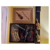 Framed Musical Artwork and Plastic Violin Set
