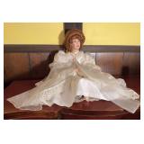 Porcelain Doll in White Lace Dress