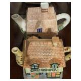 Two OCI Omnibus Cottage Teapots