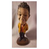 Comedic Male Figurine in Yellow Jacket