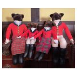 Four Plush Bear Dolls in Red Outfits