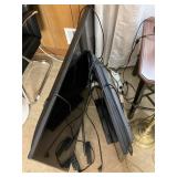 Two Samsung Flat Screen TVs