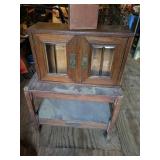 Wood Cabinet With Glass Doors, Table, and Box
