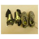 Set UA size 1.5 youth soccer shoes and shin guards