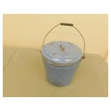 Blue and white speckled enamel ware covered pail