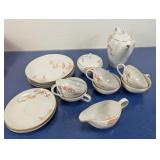 (10+) Piece Porcelain Tea Set with Floral Design
