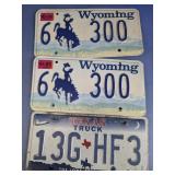 Three Vintage License Plates