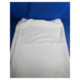White Folded Bed Sheet or Fabric Linens