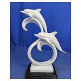 White Dolphin Sculpture on Black Base