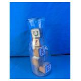 Glass Milk Bottle & Wooden Toy Blocks