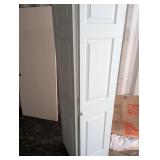 White 6-Panel Raised Panel Bifold Door