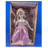 Vintage Porcelain Collectible Doll in Pink Dress