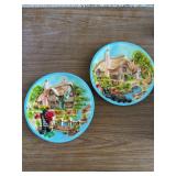 Chalkware decorative plates featuring a 3D relief scene of a thatched English cottage