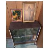 Collection of Hardcover Literary Works and Religious Framed Prints