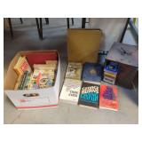 Mixed Collection of Books and Eight-Track Tapes